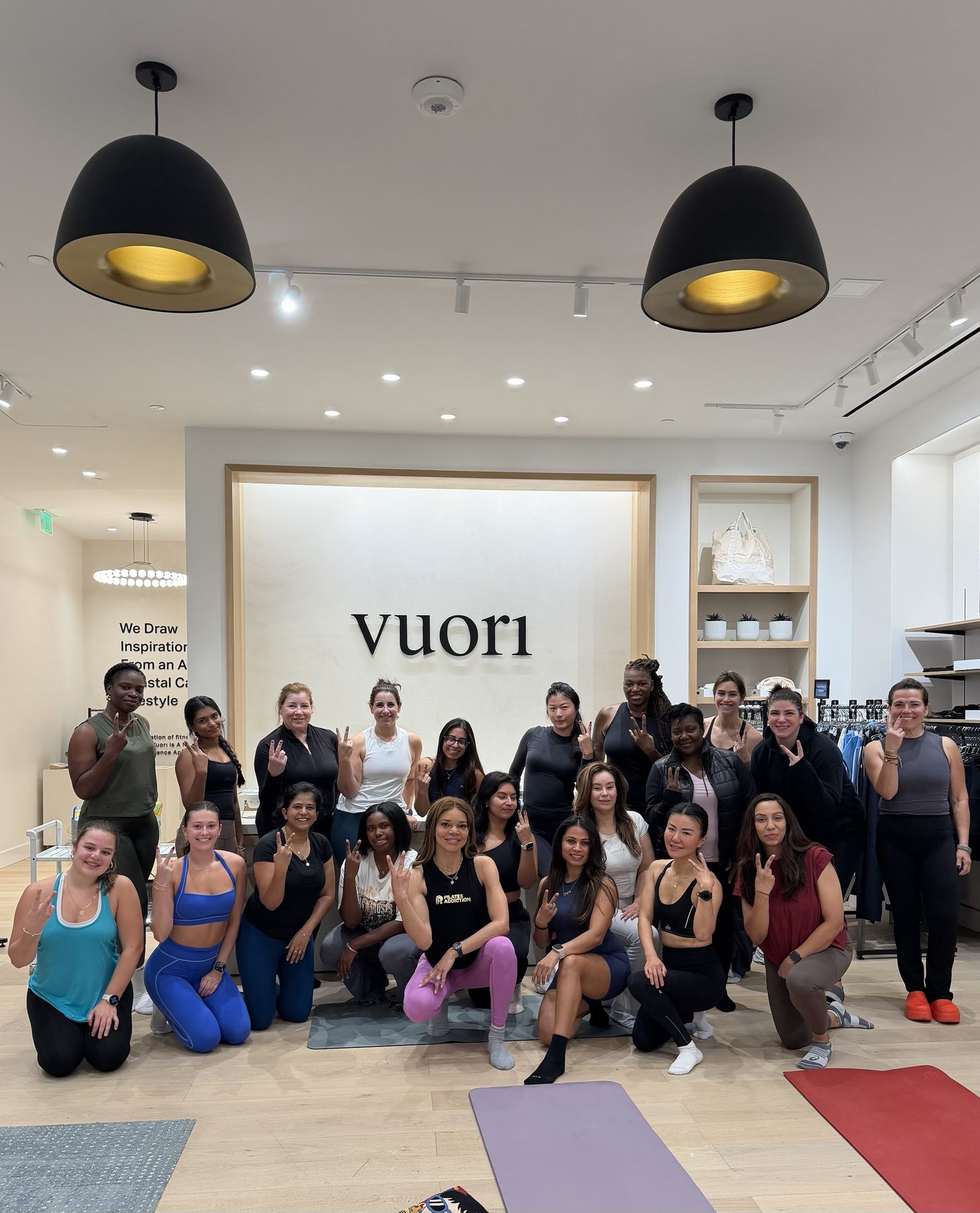 Nikki Jones with a large group after a Pilates class at the Vuori store